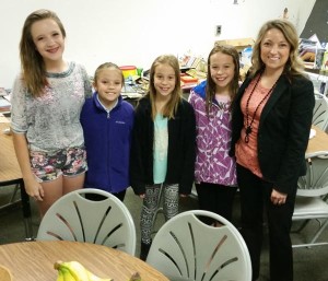 LPEF Board Member Angela Strangman, right, with her helpers delivering treats for teachers and other staff at Spence Elementary in May 2015.